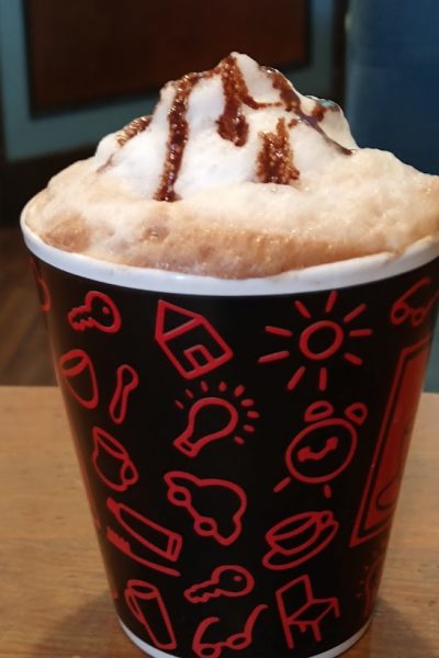 A hot chocolate with drizzle on top